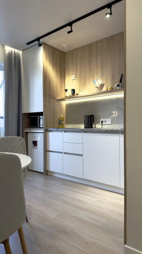 Фотография номера квартиры Квартира Уютная Однокомнатная с Диванчиком на Кухне Жк Манхэттен