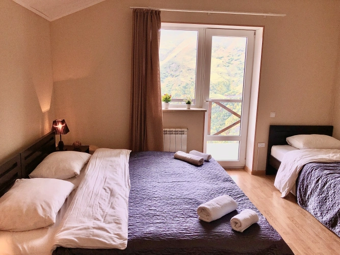 Standard Quadruple room with balcony and with mountain view