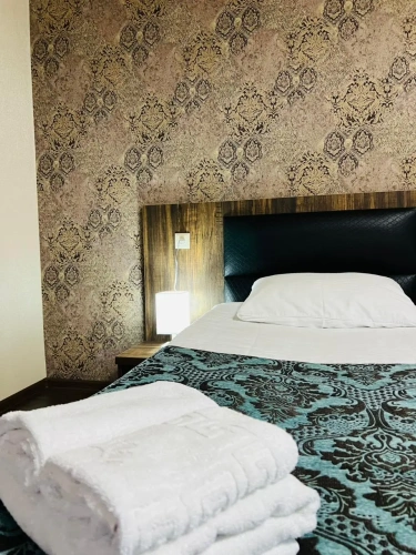 Standard Triple room with balcony and with garden view