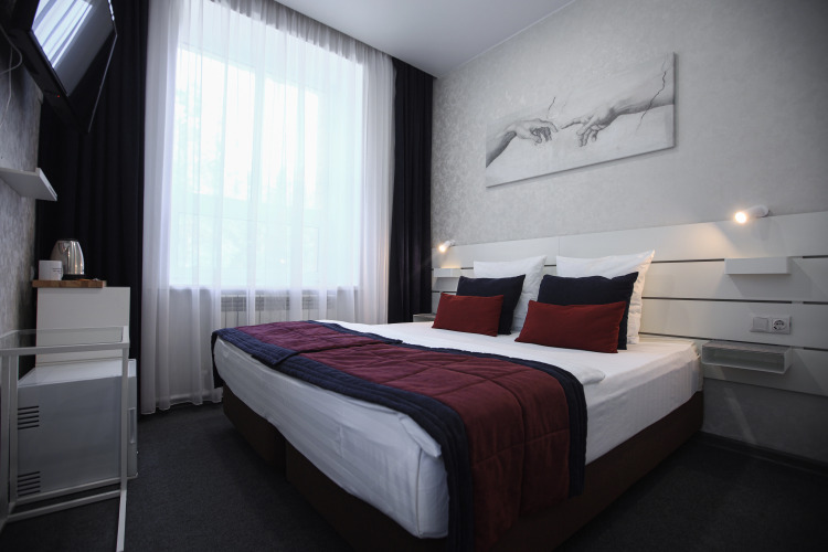 Фотография номера гостиницы Изумрудный лес