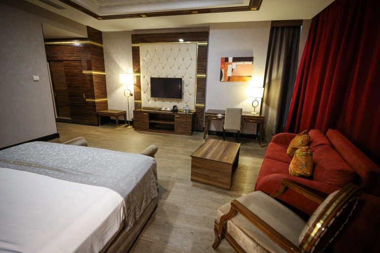 Deluxe Quadruple room with balcony