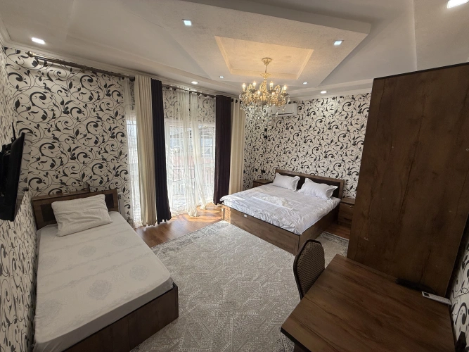 Standard Triple room with balcony and with city view