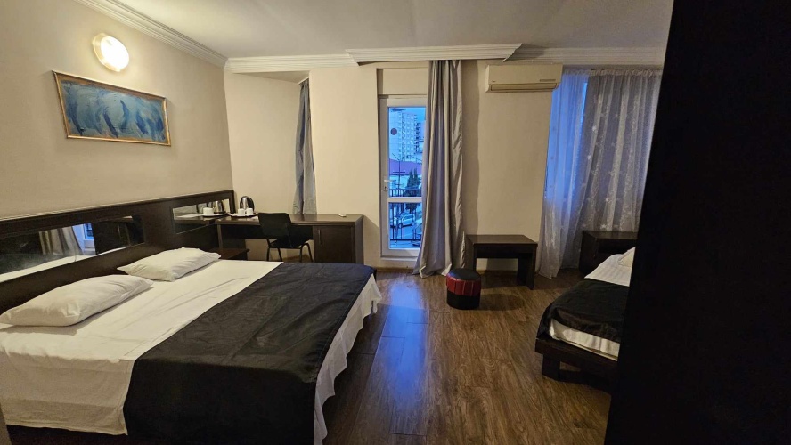 Standard Triple room with balcony and with city view