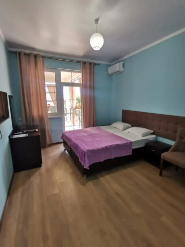 Deluxe room with balcony and with courtyard view
