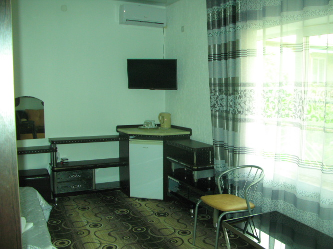 Family room with balcony and with mountain view