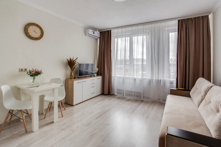 Фотография номера квартиры Апартаменты Уютная Студия с Диваном