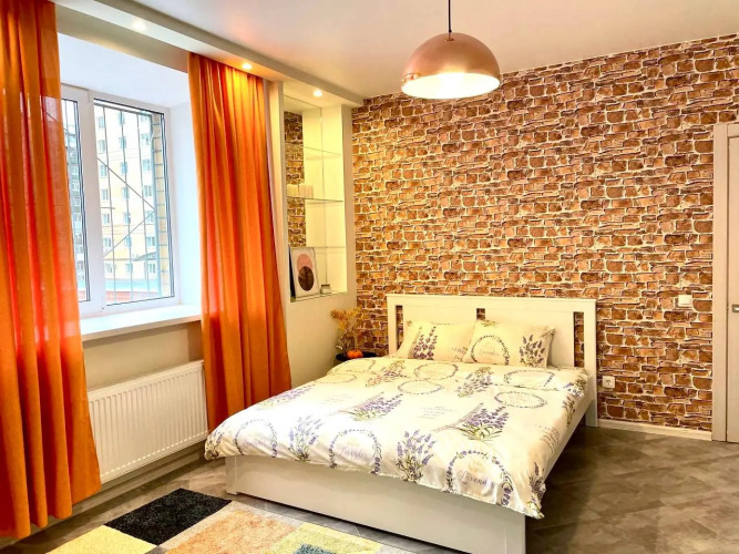 Фотография номера квартиры Апартаменты Яркая Квартира в Центре Города с Кофеваркой