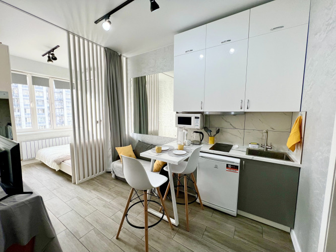 Фотография номера квартиры Квартира Светлая и уютная студия в центре города