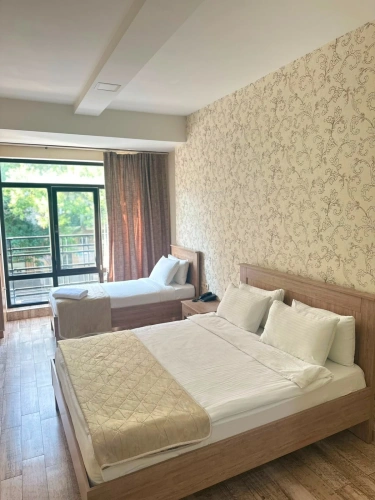 Standard Triple room with balcony