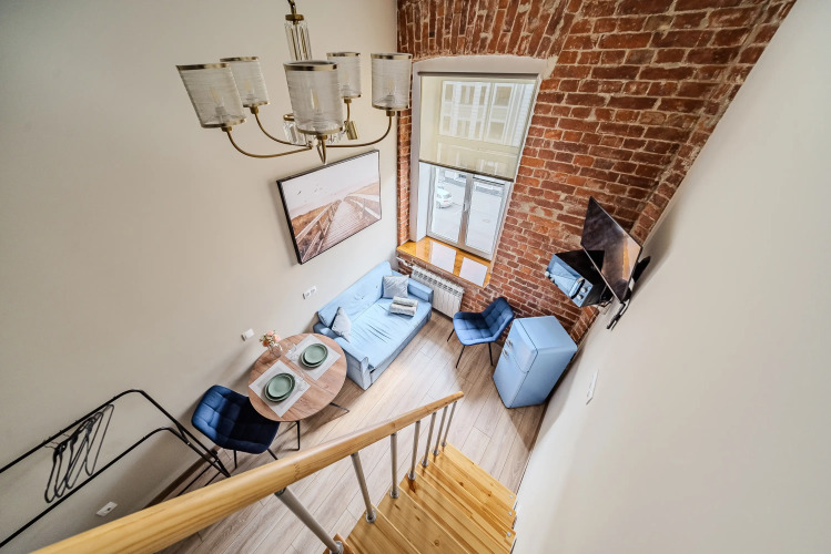 Фотография номера квартиры Апартаменты Дизайнерские двухуровневые расположены в самом центре города