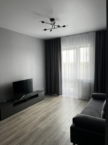 Фотография номера квартиры Квартира Уютная евро однушка в новом комфортабельном районе Засковье