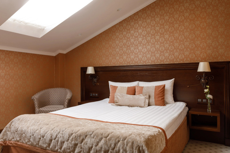 Двухместный номер Улучшенный Мансарда двуспальная кровать