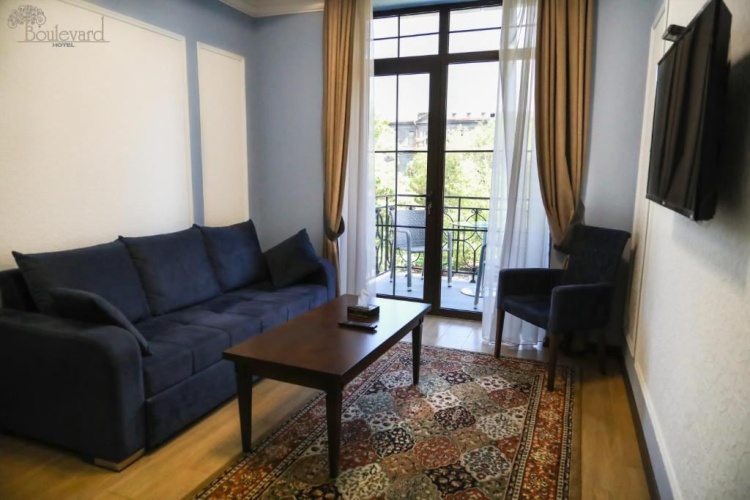 Double Apartment with balcony and with garden view