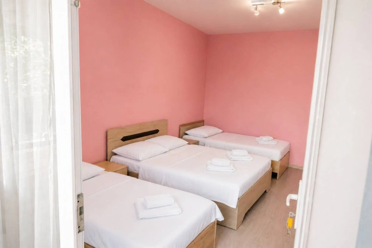 Superior Quadruple room with balcony and with courtyard view