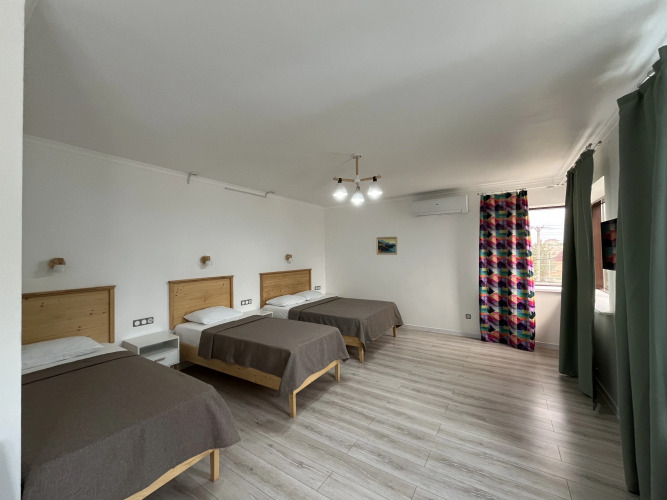 Фотография номера мини отеля Домино