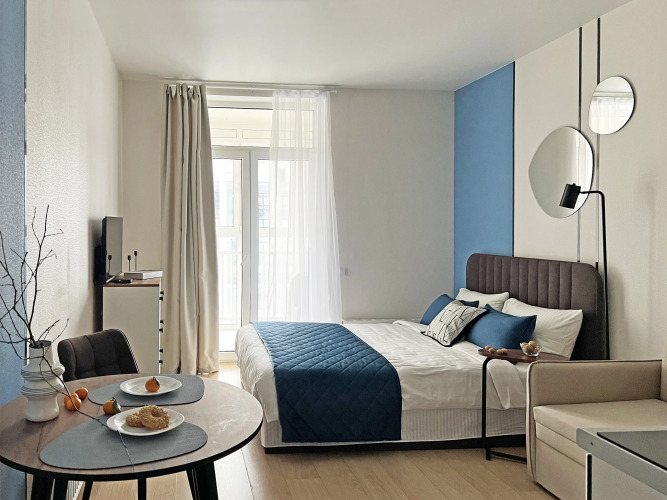 Фотография номера квартиры Апартаменты Студия Аквамарин с красивым видом на парк