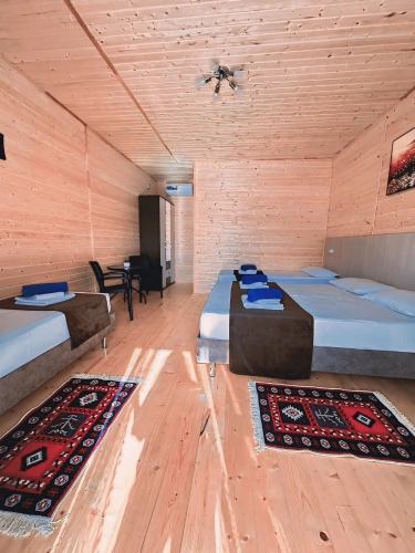 Comfort Quadruple Junior Suite with courtyard view
