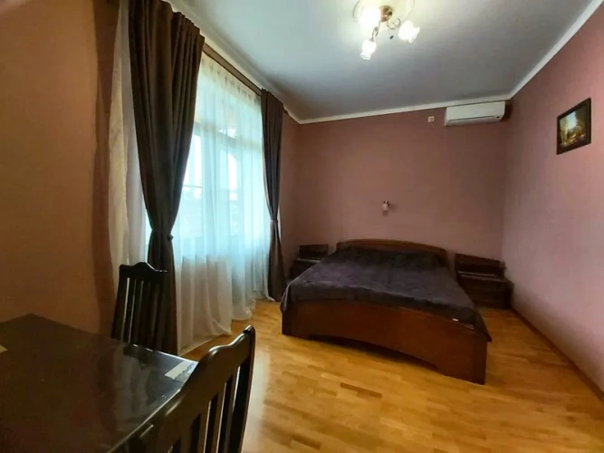 Classic Family room with balcony and with courtyard view