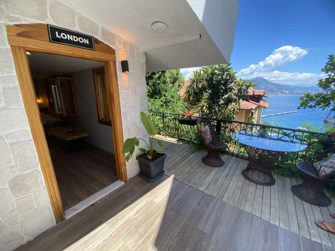 Deluxe Quadruple room with balcony and with view