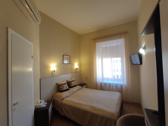 Фотография номера гостевого дома История