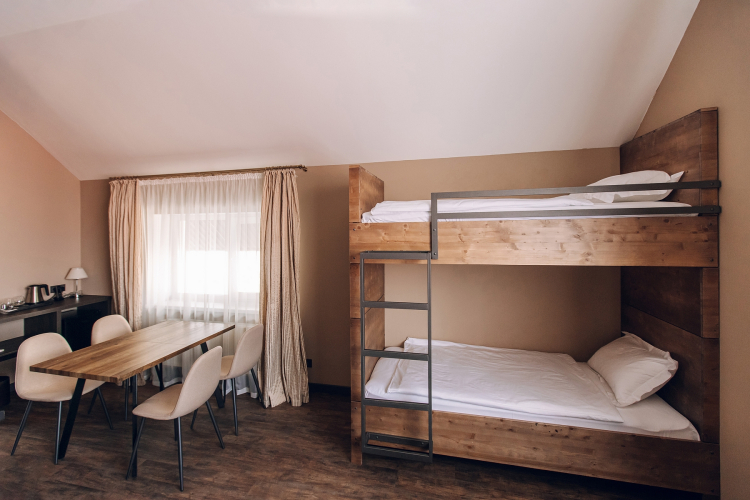 Фотография номера квартиры Апартаменты для 6 гостей с двумя двухярусными кроватями и диваном (4)