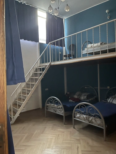 Bed in Dorm (male dorm) with balcony and with city view