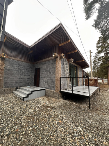 Фотография номера Коттеджа Частный дом гнѣздо с камином и двумя спальнями