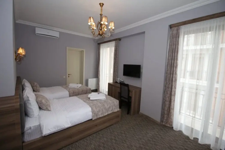 Superior Twin room with balcony and with city view