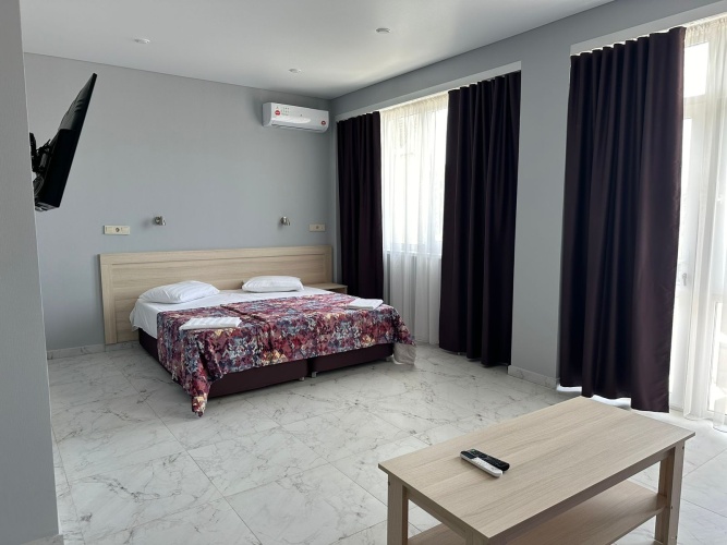1 Bedroom Comfort Quadruple room with balcony and with mountain view