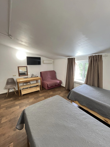 Фотография номера мини отеля Домино