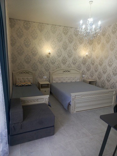 Standard Triple room with balcony and with courtyard view