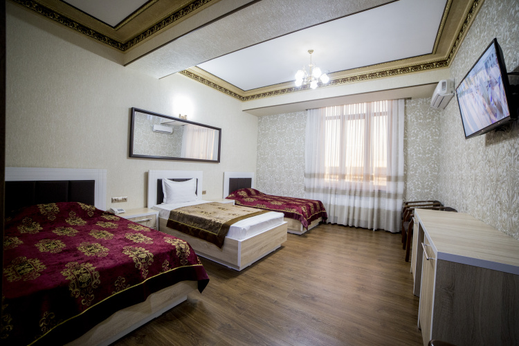 Deluxe Triple room with balcony and with view