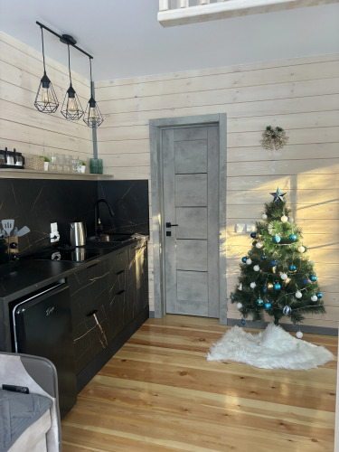 Фотография номера Коттеджа Шале Гостевой домик Среди Сосен