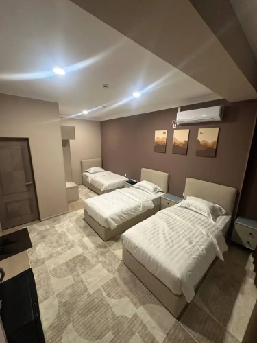 Standard Triple room with courtyard view