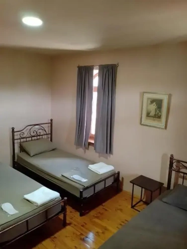 Standard Triple room with garden view