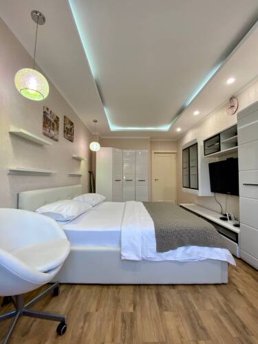 Фотография номера квартиры Апартаменты с двумя спальнями и балконом Ajax на Тюльпанов 41