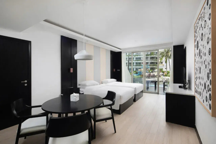 Family Quadruple Suite with balcony and with pool view