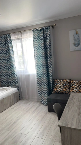 Comfort room with balcony and with courtyard view