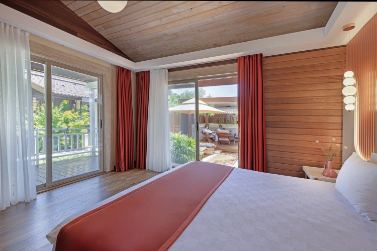 Deluxe Quadruple room with balcony and with garden view
