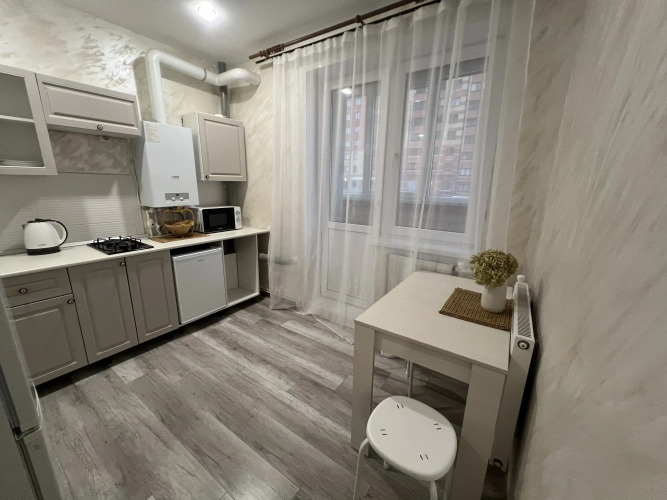 Фотография номера квартиры Квартира Уютная  в Новом Доме