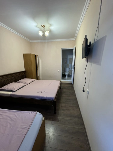 Standard Triple room with balcony and with courtyard view