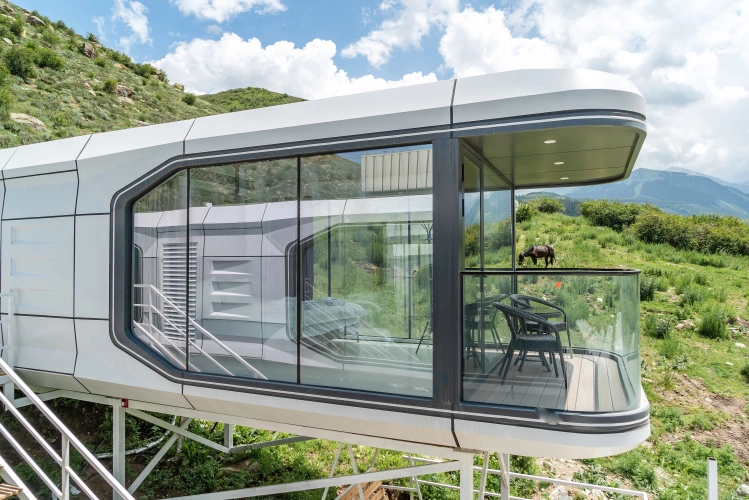 Capsule House with balcony and with mountain view