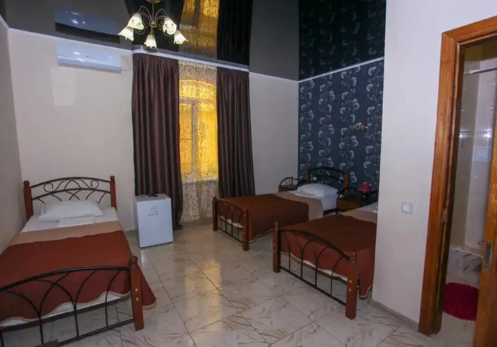 Standard Triple room beachfront