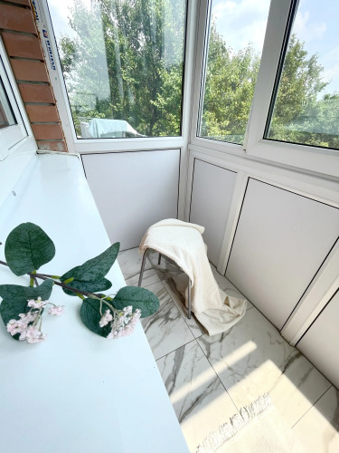 Фотография номера квартиры Квартира студия с качелями вид на тихий сад