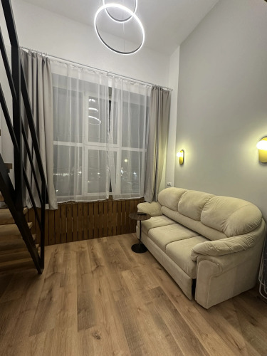 Фотография номера квартиры Апартаменты Двухуровневые 30м недалеко от центра