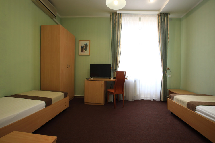 Фотография номера гостиницы Изумрудный лес