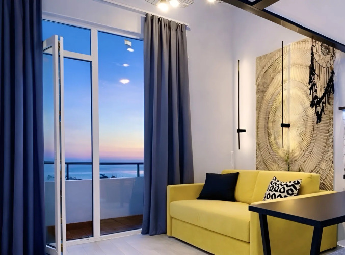 Фотография номера квартиры Апартаменты Люкс с Балконом и Видом на Море в Cамом сердце Адлера