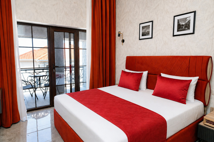 Quadruple Family Suite with balcony and with garden view