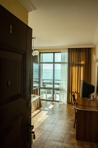 Standard Quadruple room with balcony and with sea view