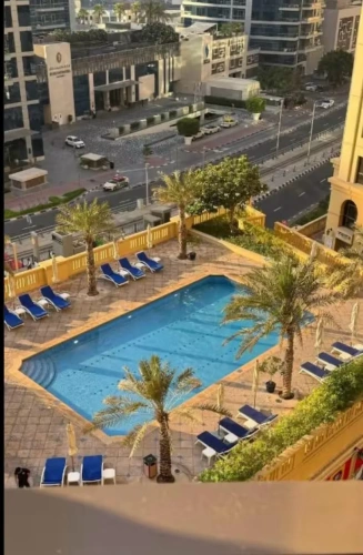 Bed in Dorm (female dorm) with pool view